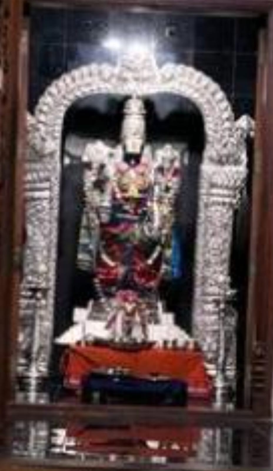 Lord Venkateswara adorned in silver prabhavali at the Hindu Temple Society of Mississippi.